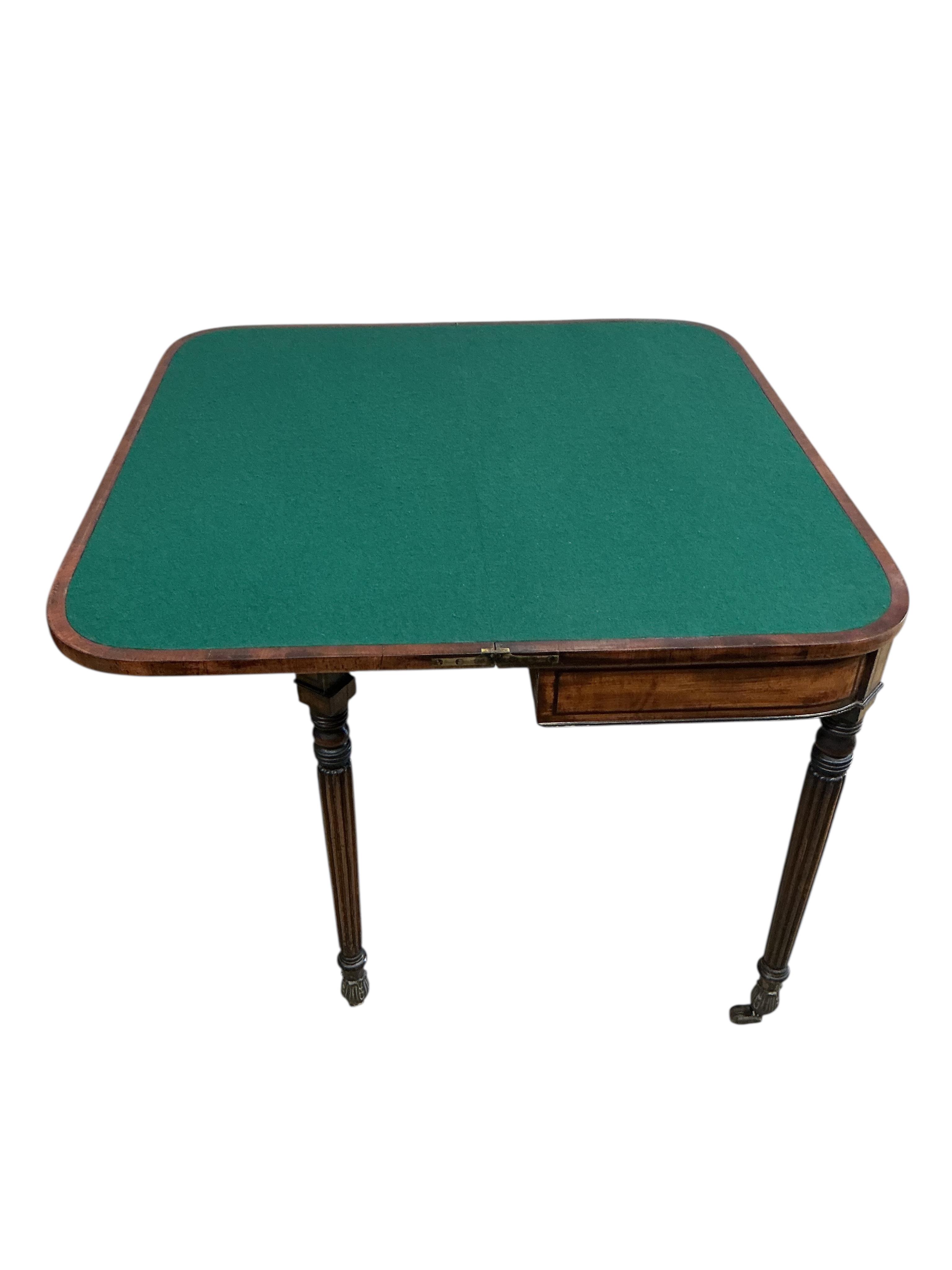 A Regency brass inlaid coromandel banded mahogany folding card table, width 91cm, depth 46cm, height 74cm